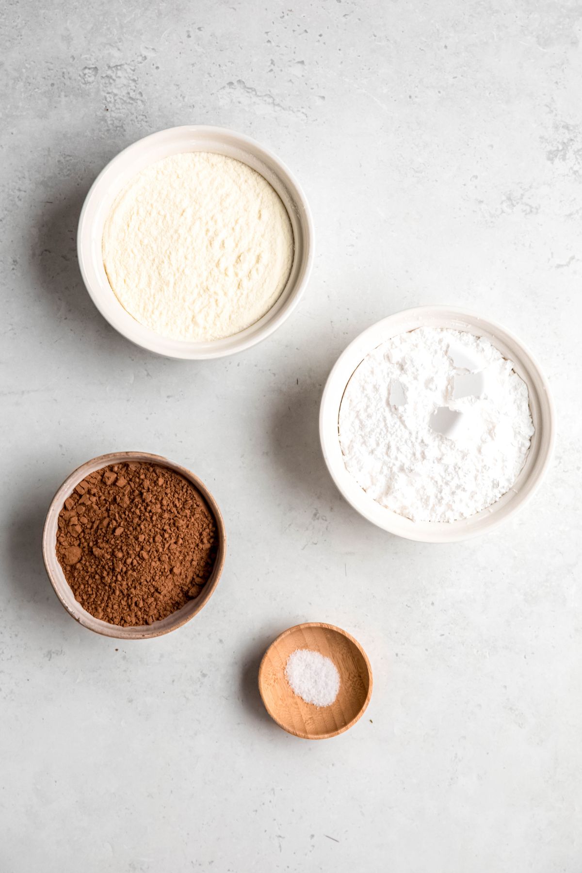 An overhead shot of all the ingredients needed to make homemade hot chocolate mix. 