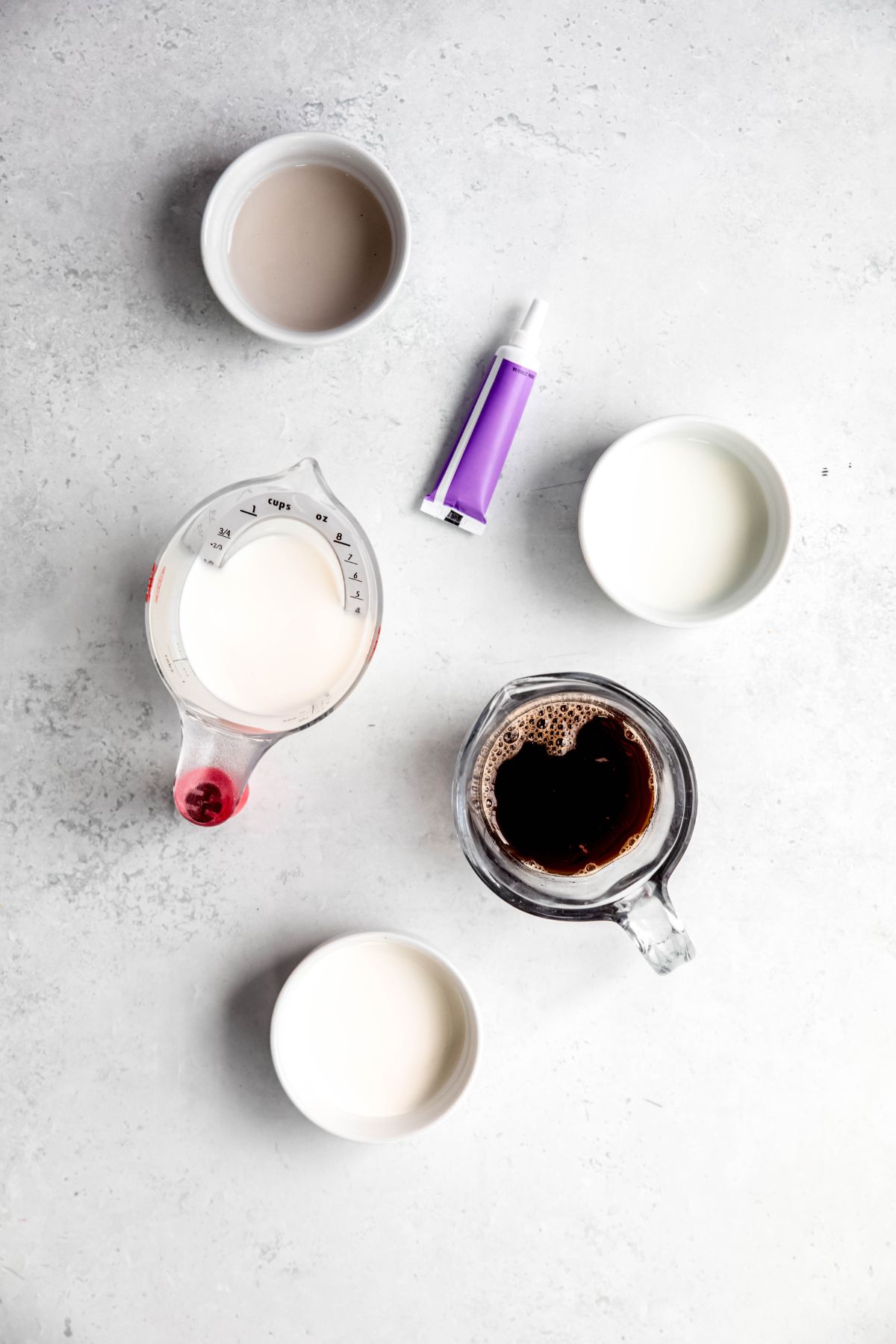 All the ingredients to make Iced Lavender Cream chai on the counter.