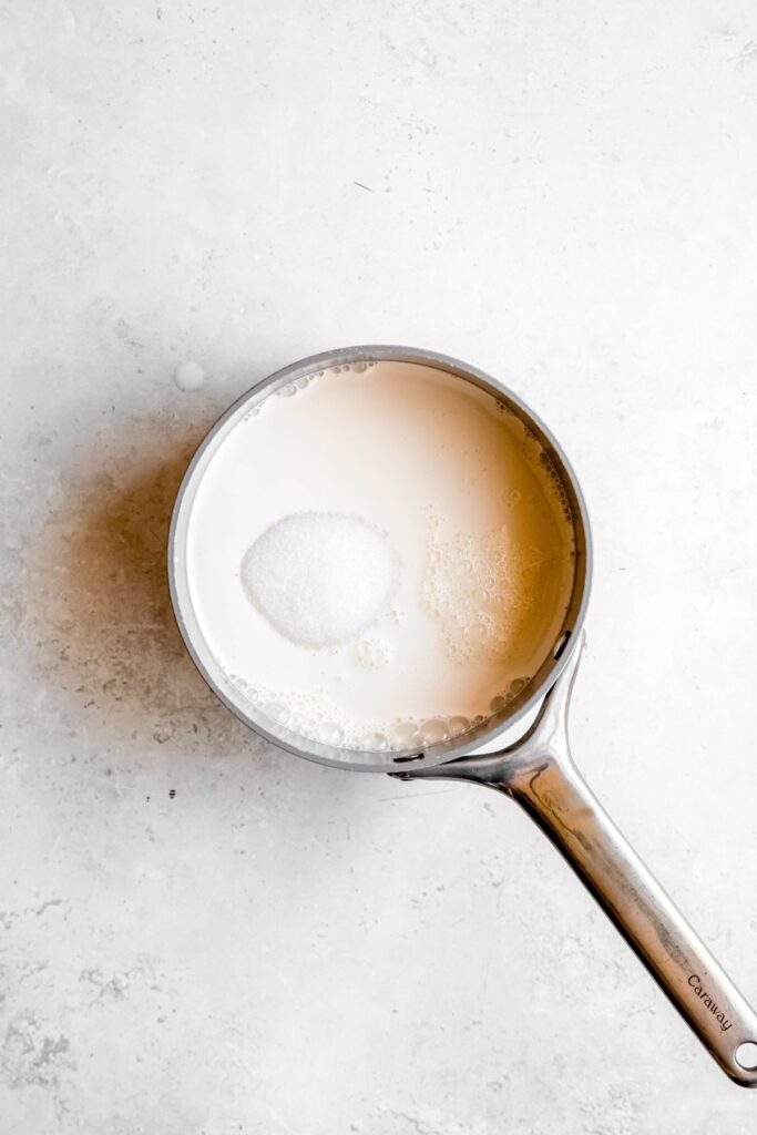 sugar, cream, and half & half added to a small saucepan. 