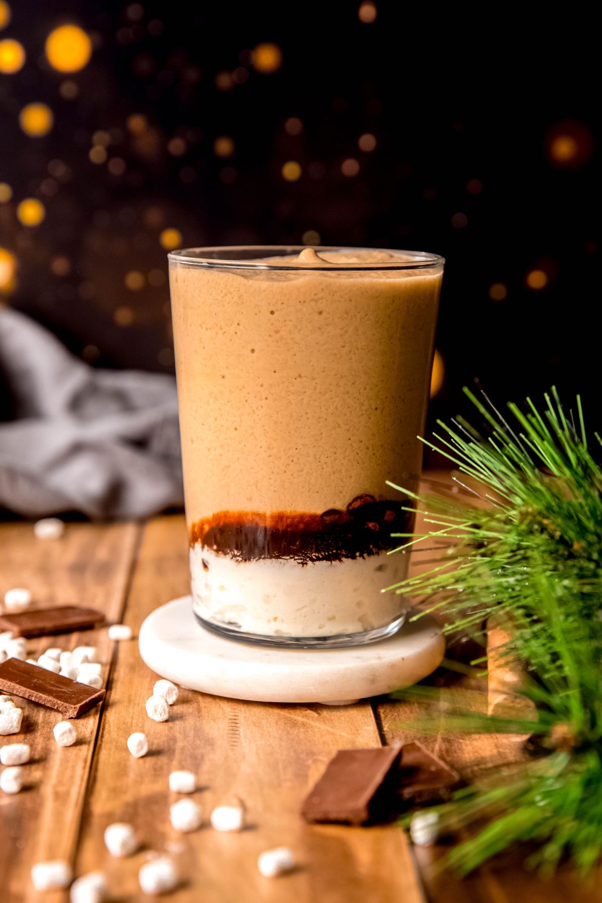 s'mores frappuccino after pouring in the frozen frappe layer on top of the whipped cream and mocha sauce layers.